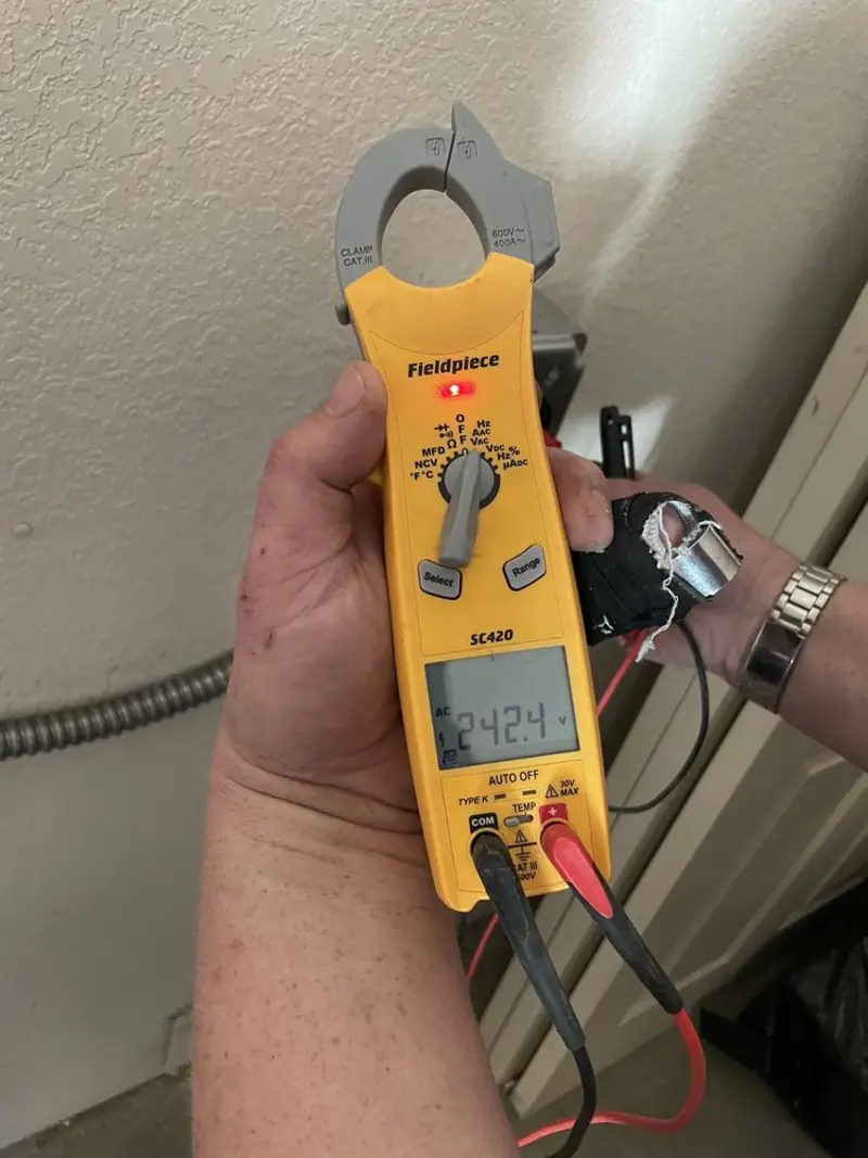 Voltage testing with clamp meter during Hot Tub / Pool Electrical Wiring in Lacey